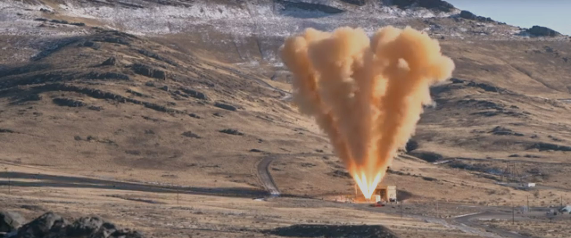 rocket test in desert mountains