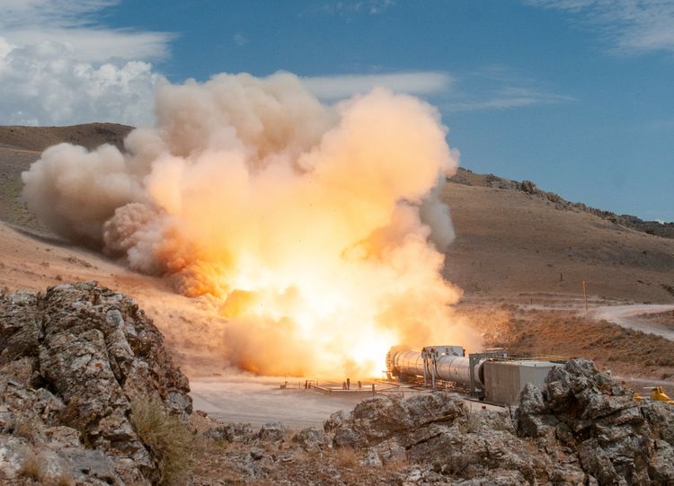 rocket booster being tested on ground